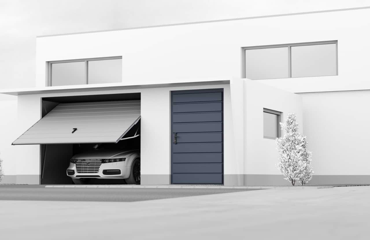 Weiße Fertiggarage mit anthrazitfarbenem Tor als Anbau an das Haus